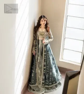It is coordinated with a farshi lehenga that is the epitome of elegance and charm as you step into the spotlight wearing this extraordinary bridesmaid dress. Make your event unforgettable with a bridal-style lehenga that is uniquely yours.