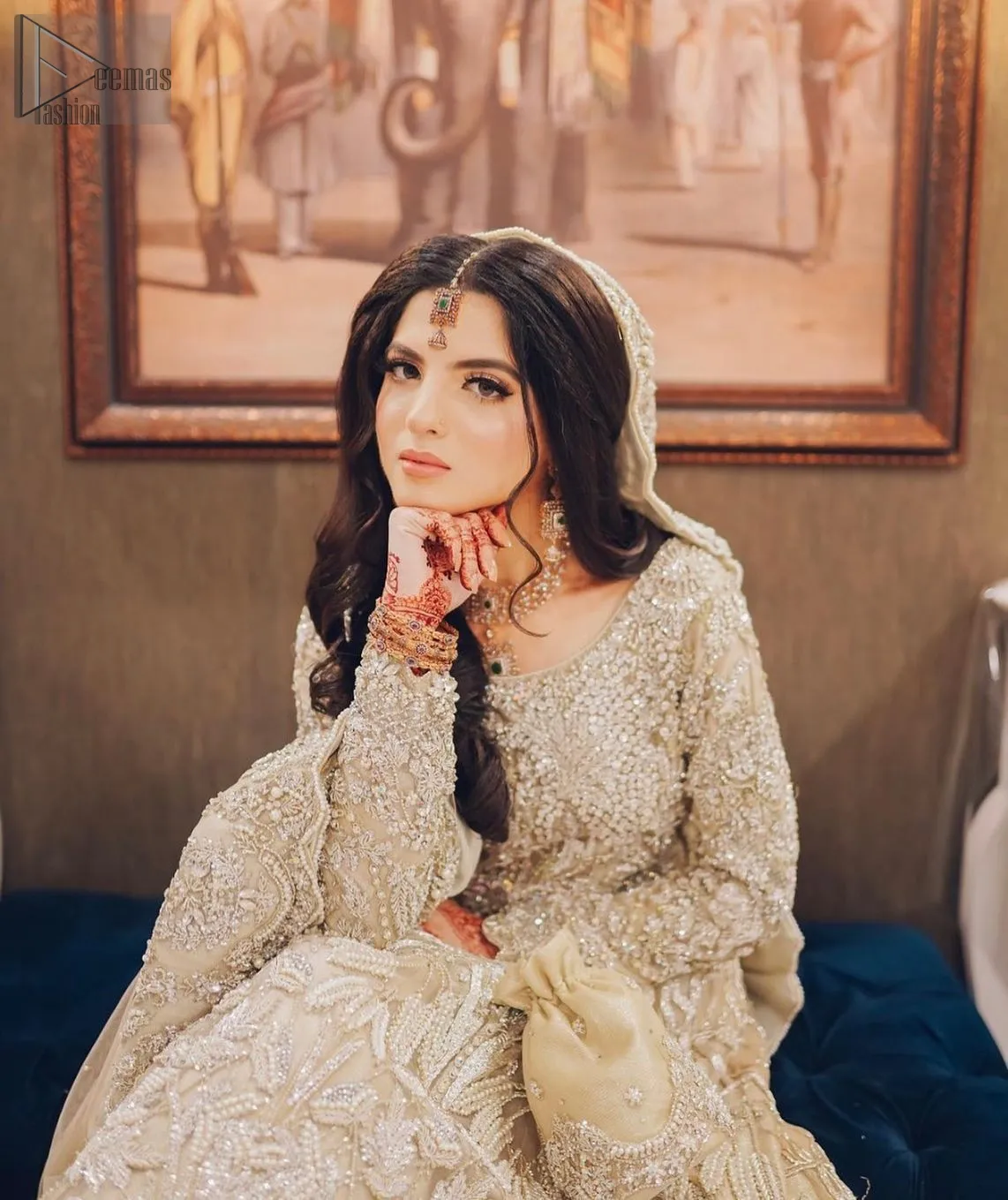 Elegance takes flight in the Fawn Back Train Scalloped Maxi Dupatta, a bridal ensemble designed to make your Nikah unforgettable. The fawn hue exudes soft romance, while the full sleeves and round neckline provide a classic silhouette.