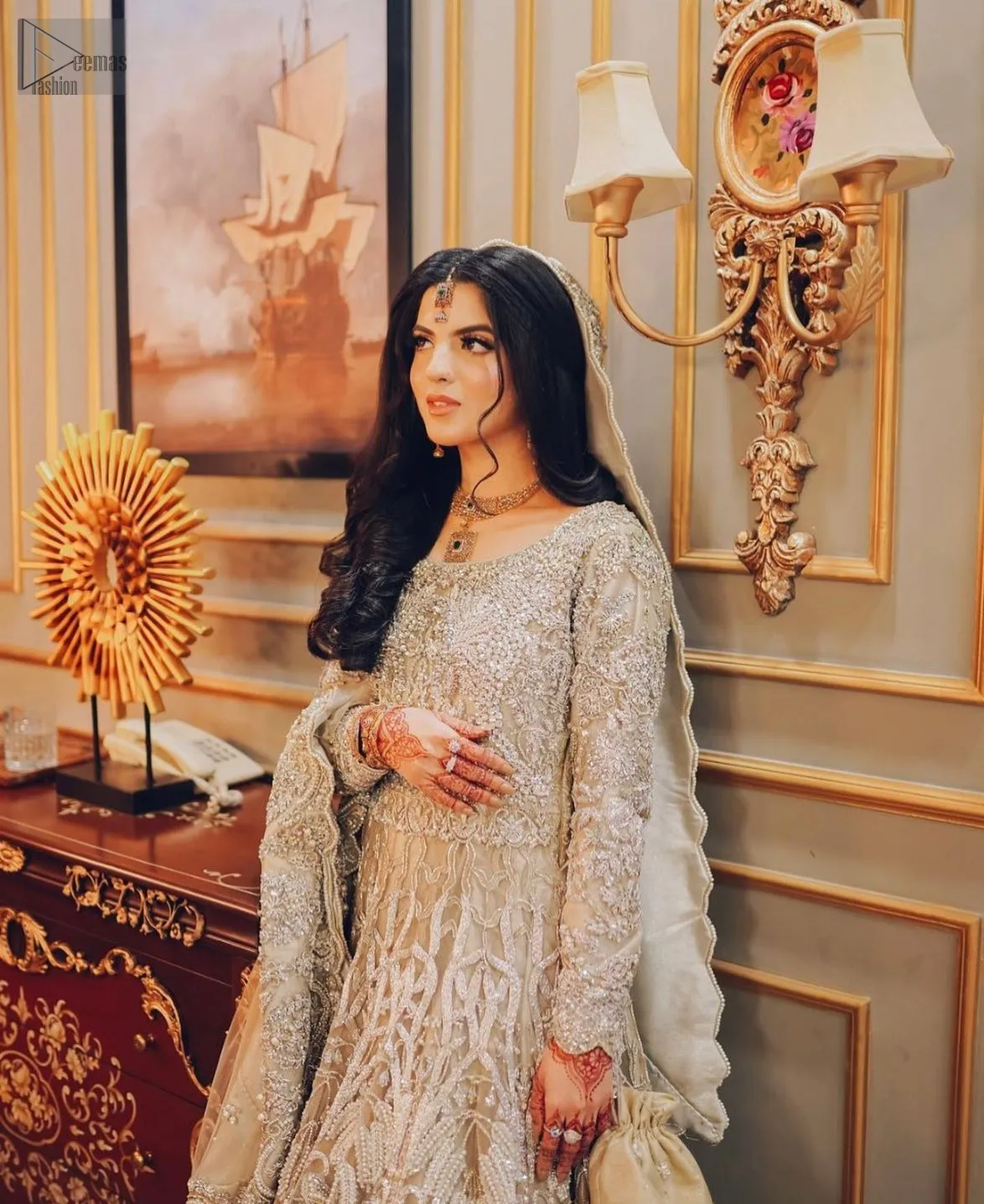 This outfit crafted from organza and raw silk, this masterpiece offers a blend of luxury and tradition, ensuring you feel ethereal and graceful as you step into your new journey.