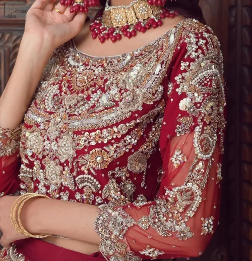 Intricate antique embroidery intertwined with silver & golden Threadwork creates a captivating design, exuding opulence with every detail.