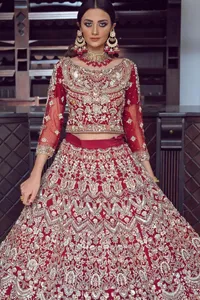 Embrace timeless allure with the Maroon Wide Flared Lehenga Blouse, an exquisite choice for your wedding celebration.