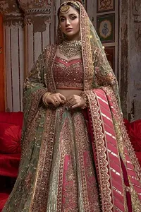 Enter your celebration like a vision in the Pink Blouse Pistachio Green Lehenga Dupatta.