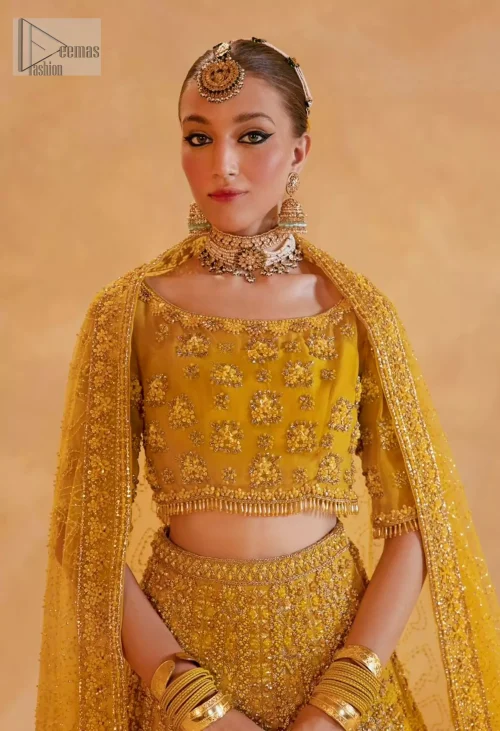Embrace the vibrant spirit of your mehndi celebration with the Mustard Lehenga Blouse Dupatta.