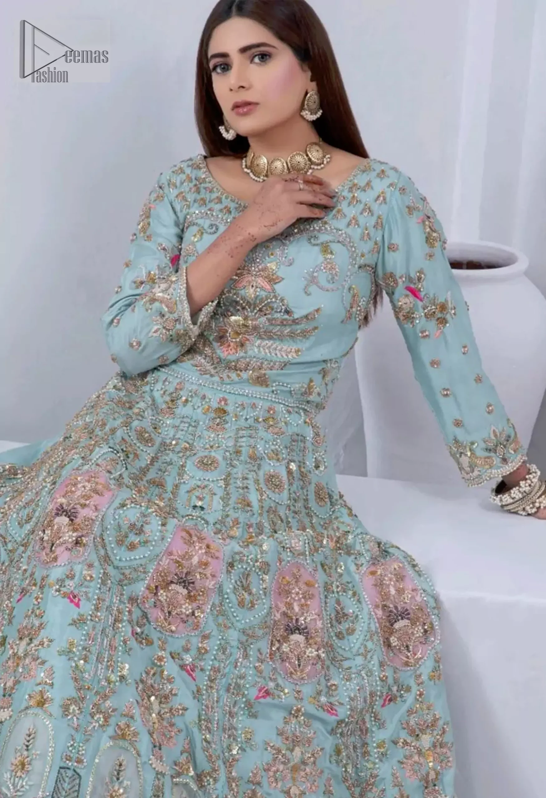 Crafted passionately from luxurious tissue silk fabric, the long-length maxi flows gracefully, while the scalloped hem creates a perfect finish. The three-quarter sleeves and neckline designs deliver a sophisticated silhouette.