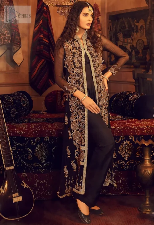 This ensemble exudes confidence and elegance paired with an inner shirt and trousers.