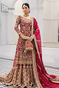The exquisite lehenga is crafted with luxurious jamawar, offering a stunning deep red shade that radiates pure elegance. Adding more to its royalty, the shirt is adorned with intricate golden embroidery, while the dramatic back train and Farshi style bring regal charm to every step.