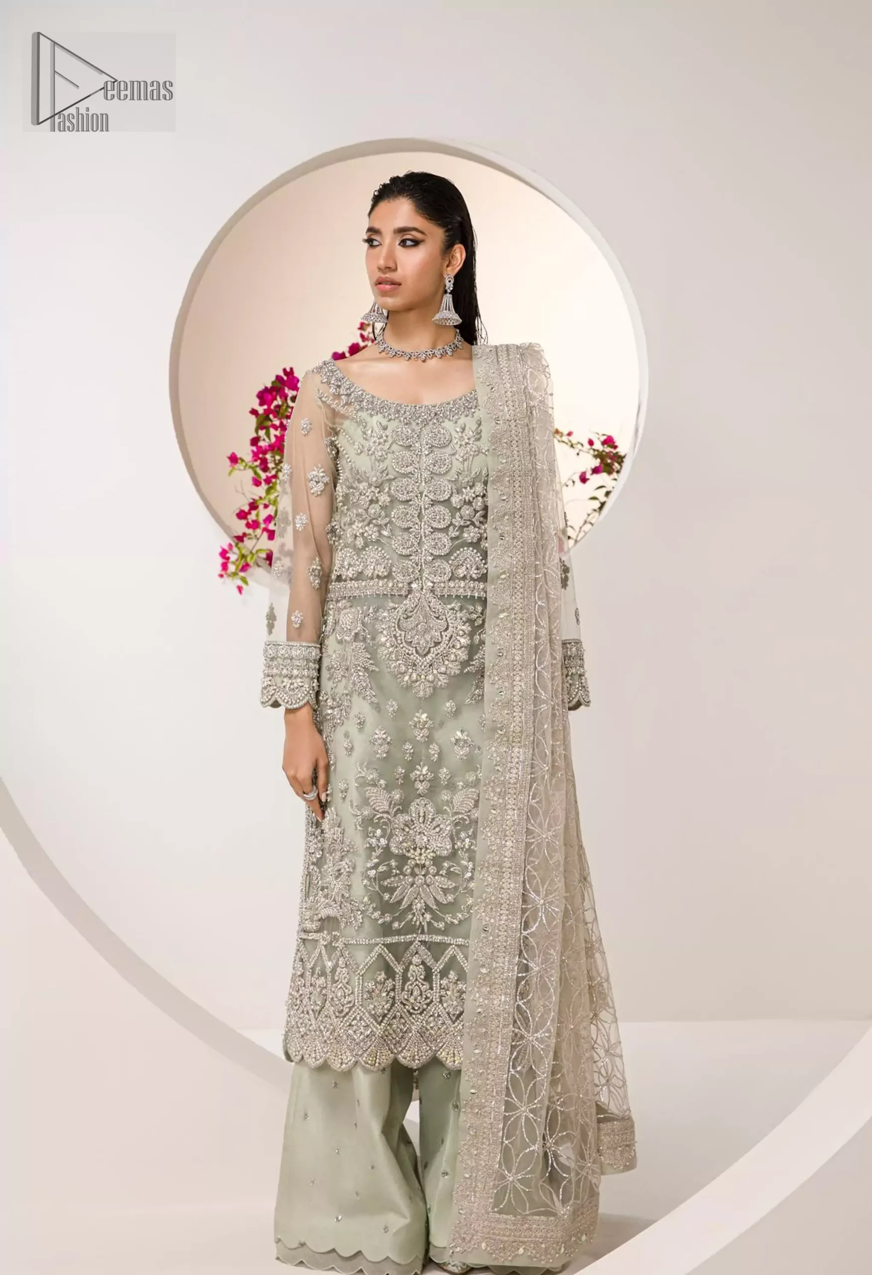 Paired with flowy palazzo pants, this outfit blends tradition and contemporary chic. The delicate mint hue exudes freshness, wrapping you in a dreamy aura ideal for your special day.