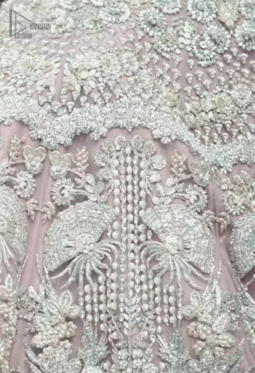 Step into your Nikah ceremony like a dream in the Pastel pink lehenga short blouse dupatta. Pastel Pink Lehenga Short