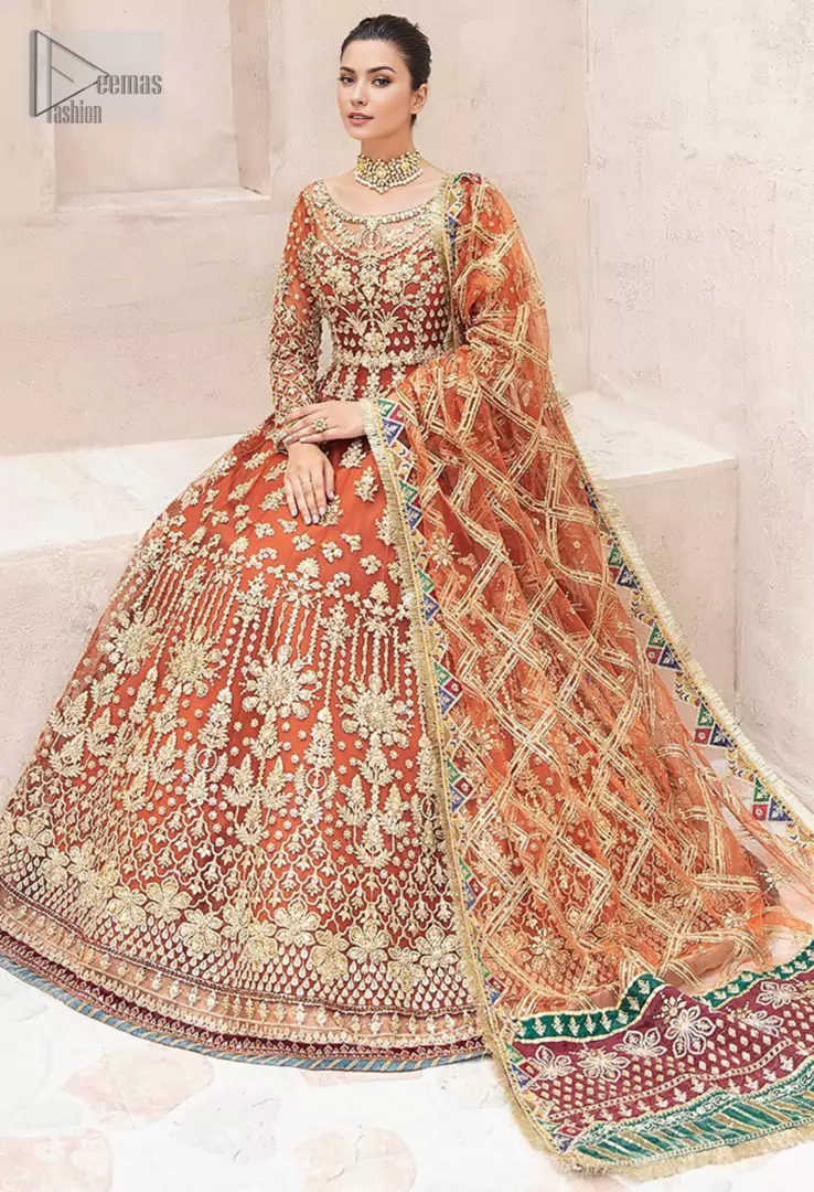 The flowing pishwas silhouette, adorned with floral patterns, adds a touch of traditional artistry, while the illusion neckline brings a modern twist.