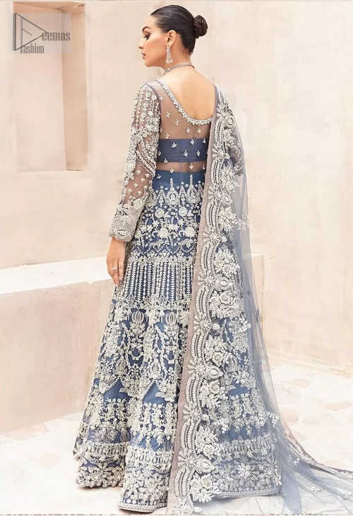 The soft, muted gray hue is beautifully enhanced by delicate silver and light gold embroidery, infusing the piece with ethereal