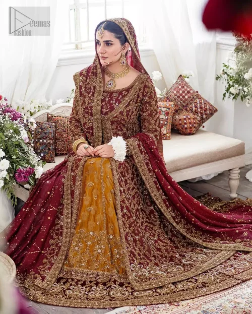 A striking harmony of maroon katan banarsi jamawar and a mustard farshi lehenga.