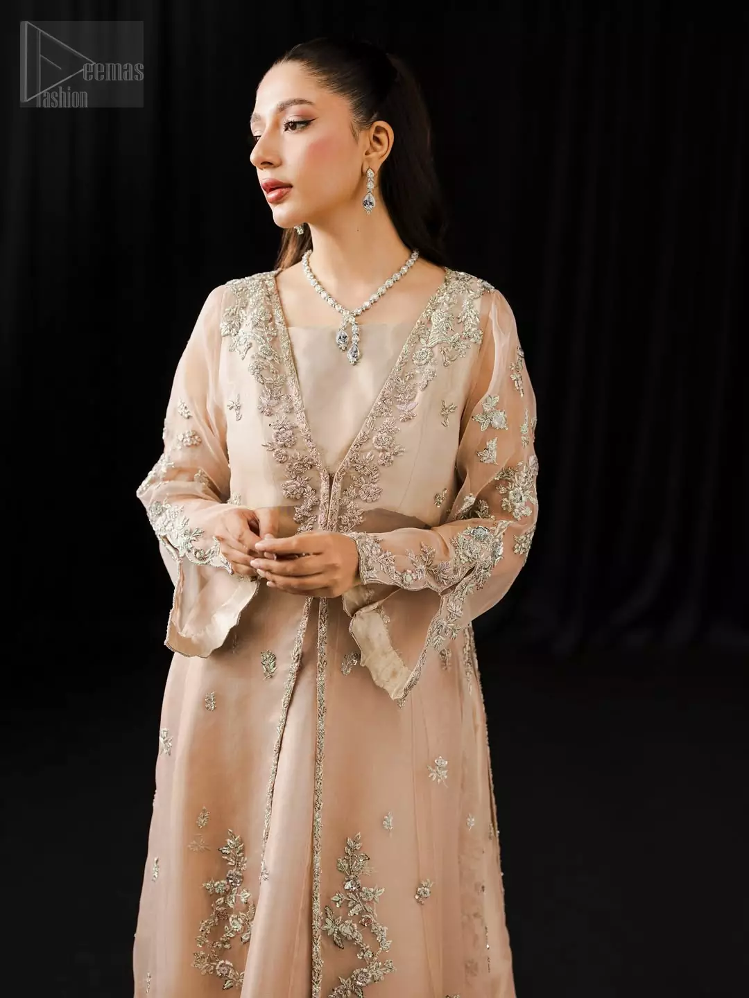 Every thread tells a story of tenderness, and makes this attire not just worn, but felt like an ode to beginnings touched by light and grace.